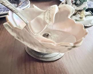 Antique porcelain shell-form serving bowl with silver spoon