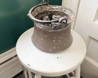 Antique stoneware crock on white painted stool