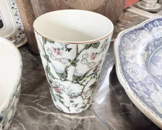 Hand-painted floral porcelain vase with transferware bowls