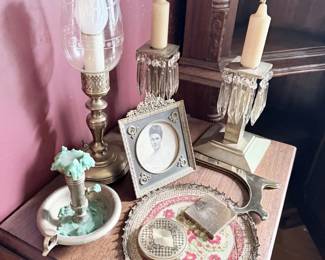 Crystal prism candlesticks, hurricane lamp, framed photo
