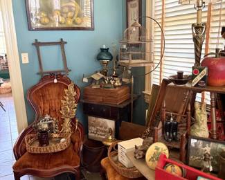 Victorian chairs, floor lamp, and folk art corner