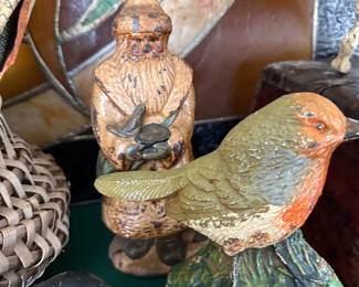 Antique chalkware bird and folk art figures