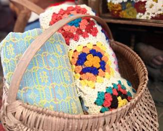 Vintage granny square afghans in splint basket