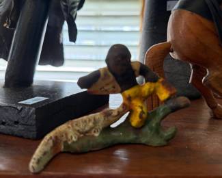 Folk art carved bird and animal figures