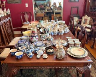 Mahogany dining table with blue and white china display