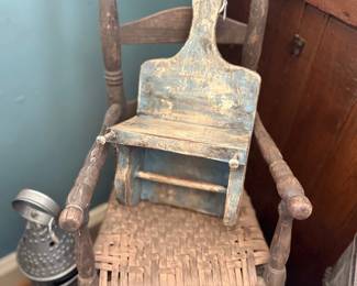 Primitive ladder back chair with woven seat