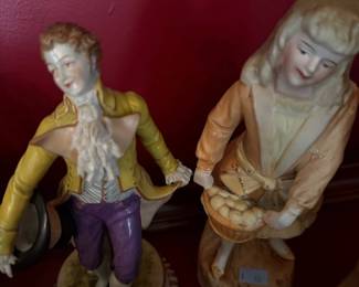 Pair of bisque porcelain figurines, boy and girl