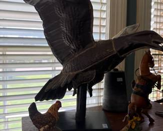 Large carved wood eagle on stand