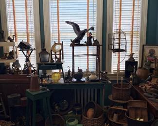 Decoys, lanterns, birdcage, and primitive decor