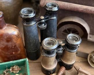 Antique field binoculars, brass hardware, and keys
