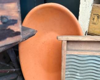 Large terracotta bowl and antique washboard