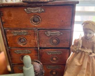 Antique oak spice cabinet with brass pulls