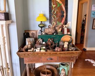 Primitive farm table with dough bowl and pottery