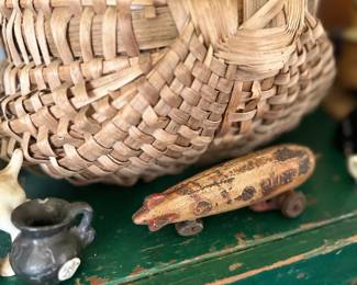 Antique buttocks basket and folk art fish carving