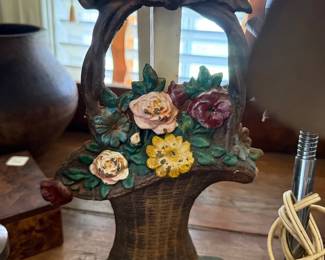 Cast iron flower basket doorstop with bow