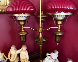 Brass double student lamp with cranberry shades