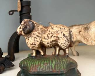 Antique chalkware ram figure on painted base