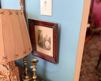 Figural table lamp and framed antique engraving