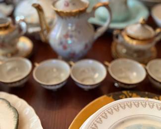 Antique porcelain chocolate pot and demitasse cups