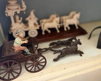 Antique cast iron horse-drawn cart toys and carved coach