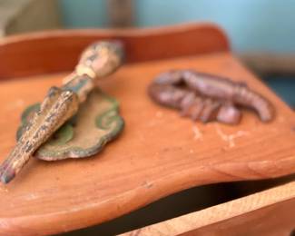 Folk art carved alligator and lizard figures