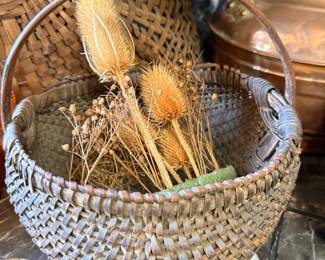 Antique splint basket with dried teasel arrangement