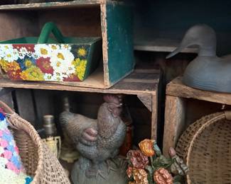 Cast iron chicken and flower doorstops with baskets