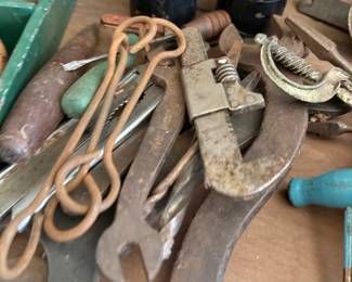 Antique hand tools, wrenches, and binoculars lot