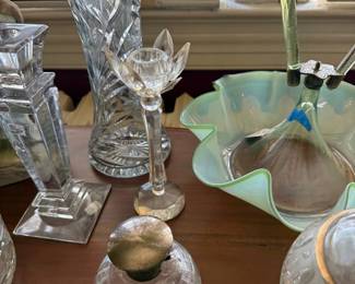 Cut crystal vase, candlesticks, and perfume bottles
