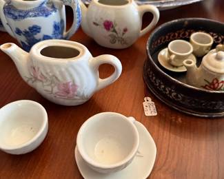 Child's china tea sets and miniature dishes