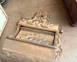 Antique embossed brass wall match holder