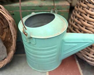 Vintage turquoise watering can