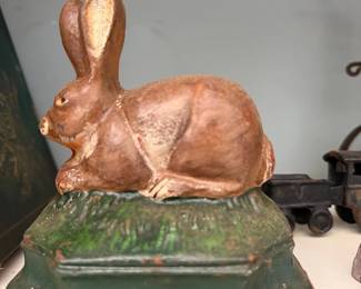 Antique chalkware rabbit on painted base