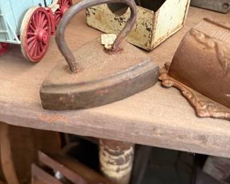 Antique cast iron sad iron and primitives