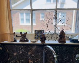 Kitchen window display, folk art birds and wire sculpture