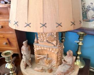 Carved wood figural fireplace lamp