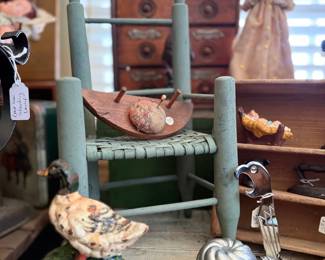 Cast iron duck doorstop and child's painted chair