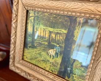 Landscape print in ornate carved gilt frame