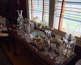 Crystal and cut glass collection on antique buffet