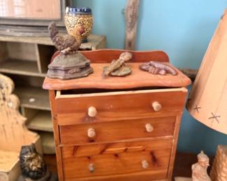 Child's pine chest of drawers and folk art figures