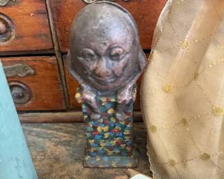 Antique figural still bank on block base
