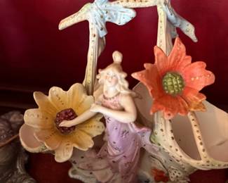Art Nouveau porcelain fairy figurine with flowers