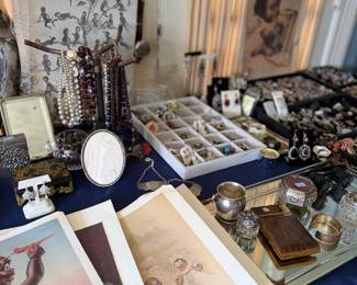Vintage jewelry display, antique prints, silver vanity items