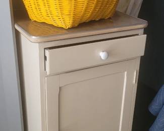 Freshly redone cabinet, wicker basket