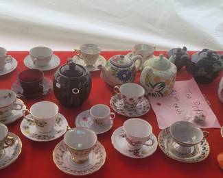 Lots of vintage tea cups and tea tea pots, sugar/ creamers