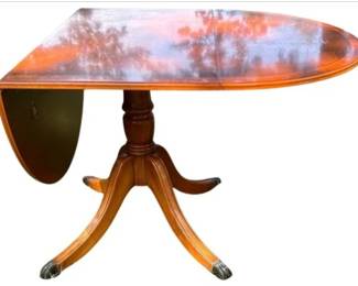 Duncan Phyfe Style Single Pedestal Drop Leaf Dining Table - Cherry & Satinwood Banding, Brass Casters