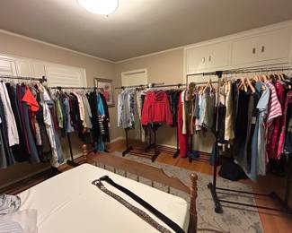 Racks and racks of clothing, hats, shoes, belts