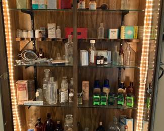 OLD PHARMACEUTICAL BOTTLES / GUN CABINET