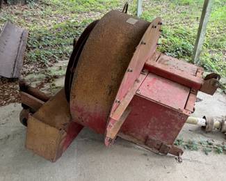 A scraper and some sort of lawn vacuum