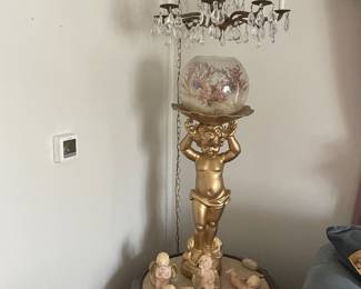 Beautiful swag chandelier and statue